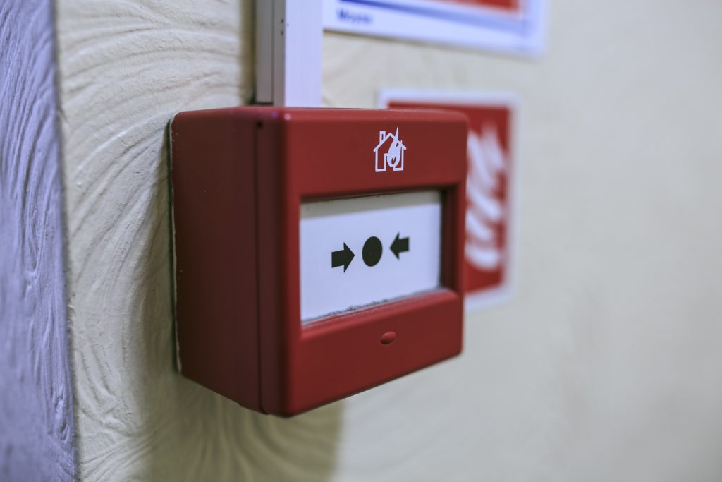 Fire alarm detector on the wall